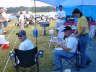 Sitting down is Cody Stone. twostroke fanatic from Minnesota. His current regular rider is a Kaw H1 with a rubber mounted H2 motor, Mr. & Mrs Iron Butt... (Allen and Bobbie Wood,).  Russ in the back.
